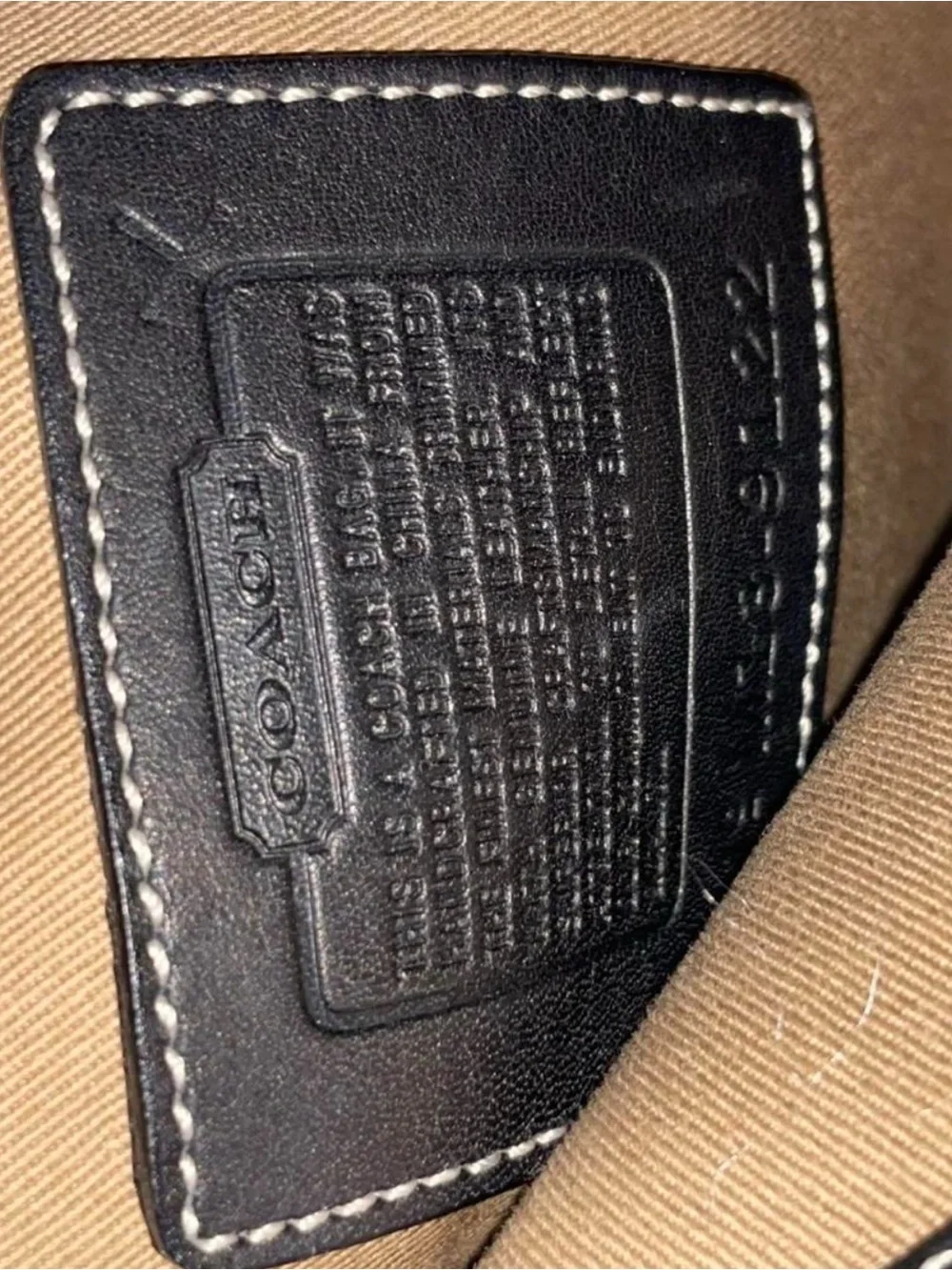 Coach Tan and Black Canvas Crossbody with Front Buckle